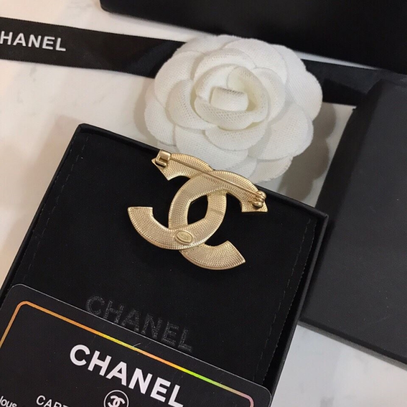 Ch**el brooches